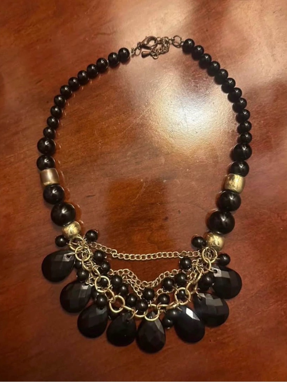 Elegant Black Beaded Statement Necklace with Gold Accents